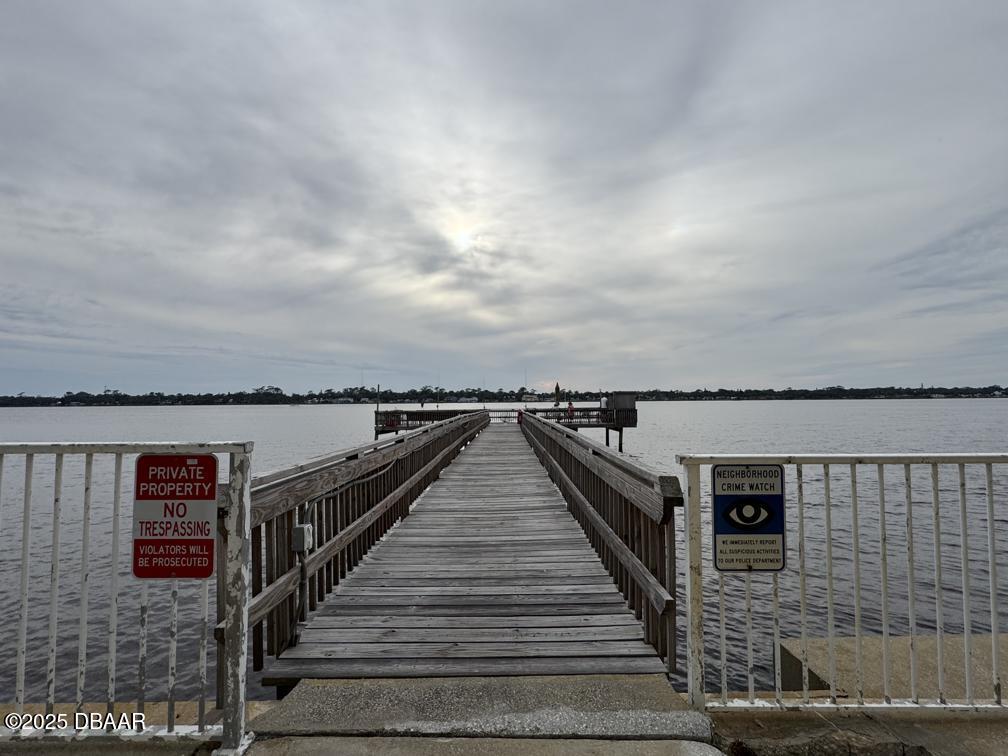 2711 North Halifax Avenue, Unit 385 Daytona Beach, FL 32118 - Photo 16 of 18 a view of a balcony with wooden floor and ocean view