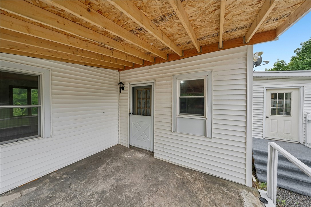 6328 Warboys Road Byron, NY 14422 - Photo 3 of 31 Covered Front Porch