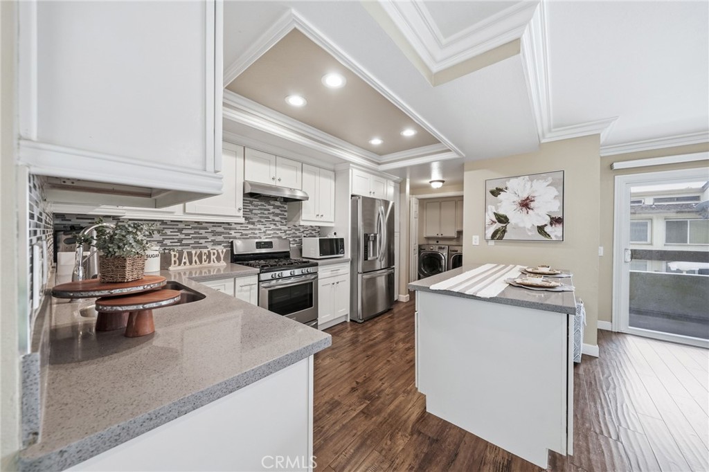 259 Scenic Way Brea, CA 92821 - Photo 13 of 62 a kitchen with granite countertop stainless steel appliances and wooden cabinets