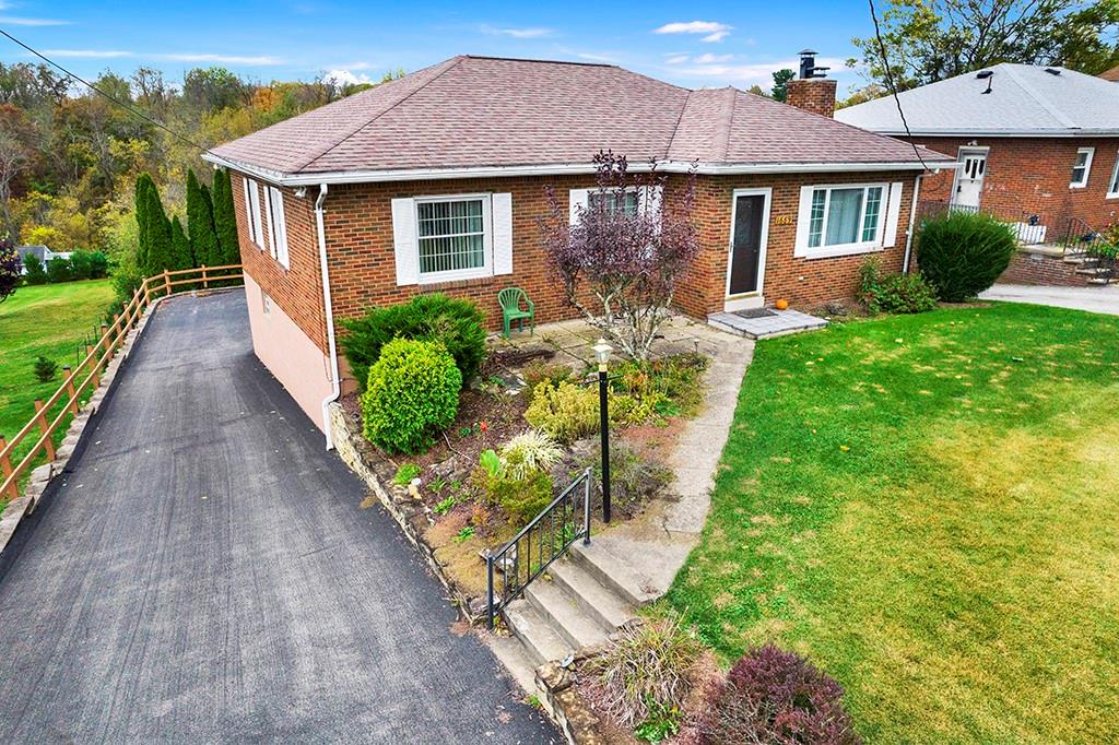 1689 4th Street Monongahela, PA 15063 - Photo 1 of 31 a front view of a house with garden