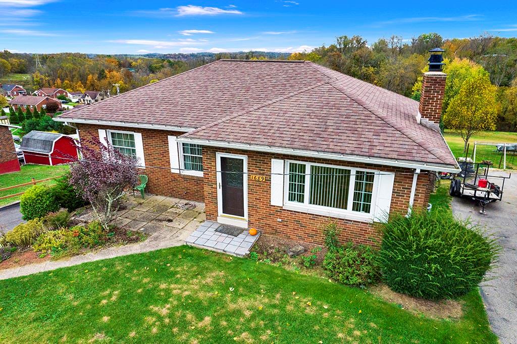 1689 4th Street Monongahela, PA 15063 - Photo 2 of 31 a view of a house with a yard
