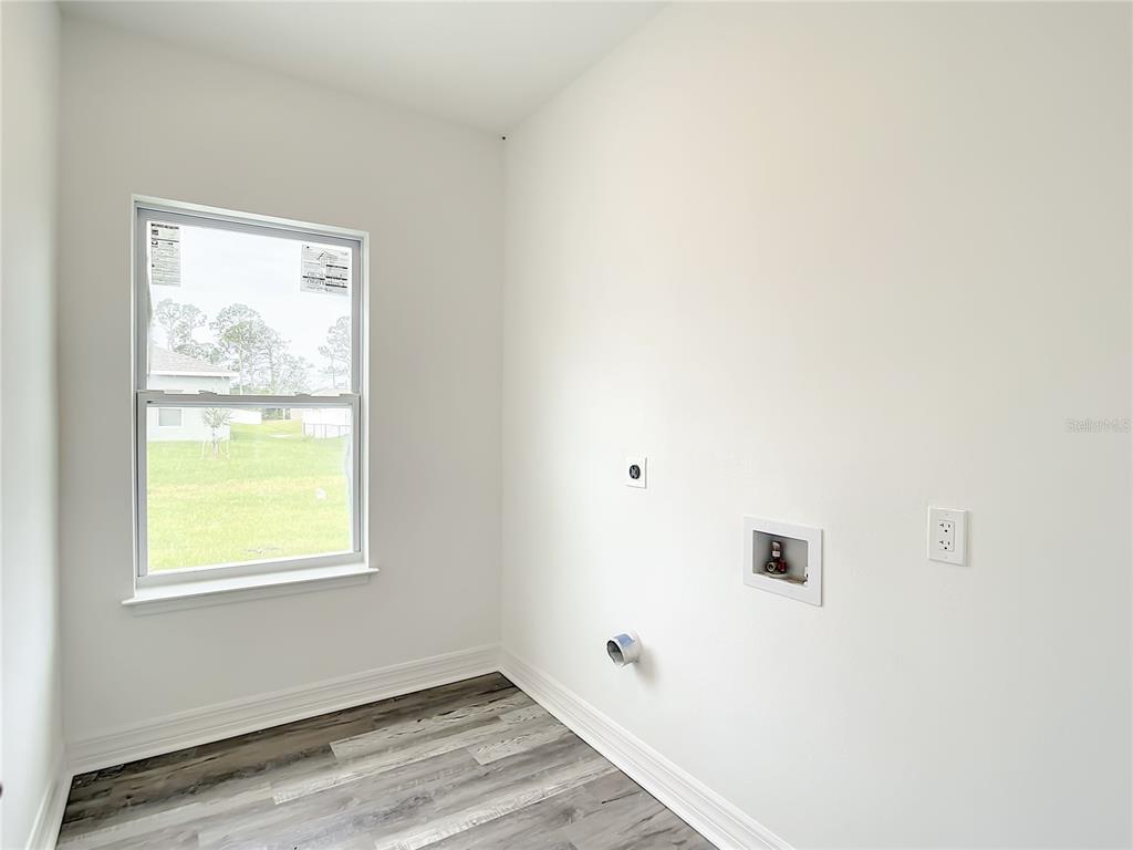 5123 Weatherton Street North Port, FL 34288 - Photo 15 of 16 a view of an empty room with a window