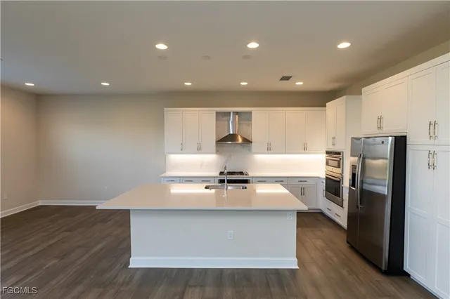 a view of a house with backyard tub and couches