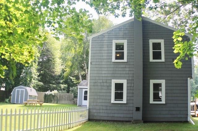 Side view with backyard fence