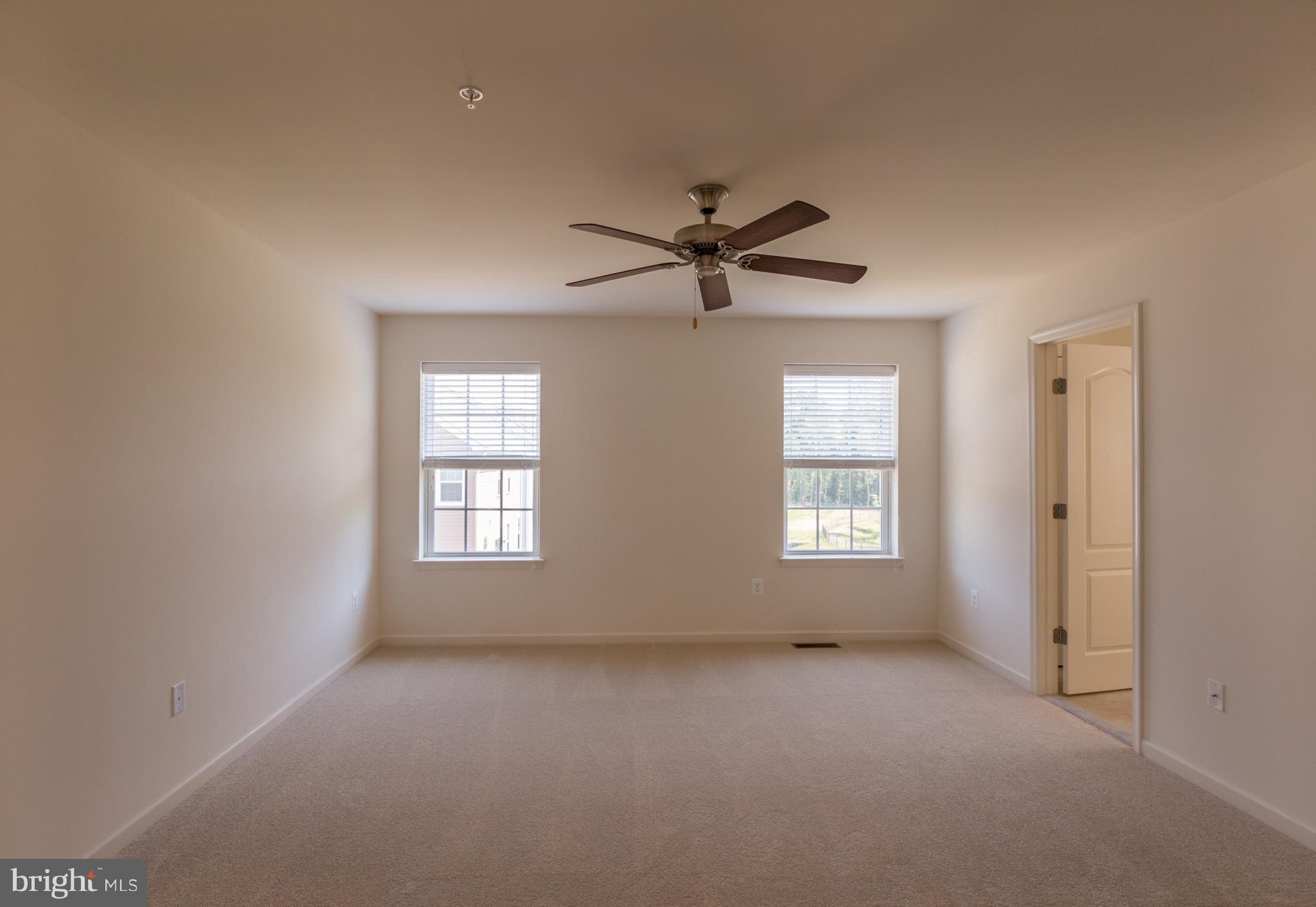 902 Ramble Run Road Middle River, MD 21220 - Photo 19 of 30 a view of an empty room with a window