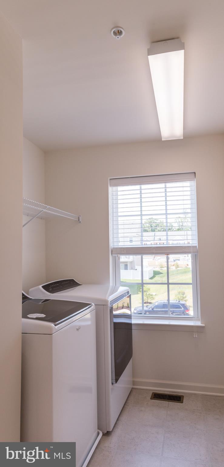 902 Ramble Run Road Middle River, MD 21220 - Photo 27 of 30 a utility room with dryer and washer