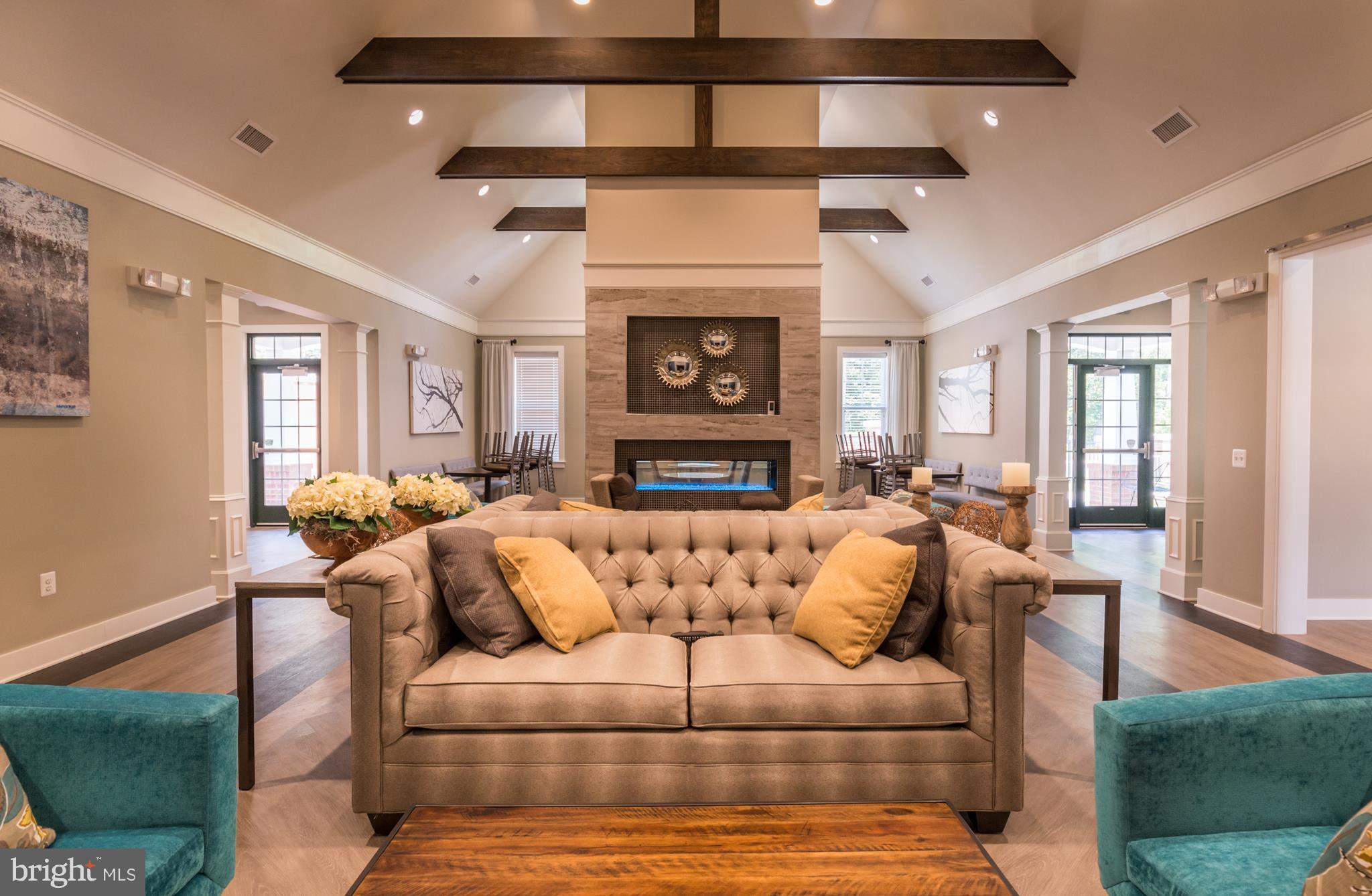 902 Ramble Run Road Middle River, MD 21220 - Photo 8 of 30 a living room with furniture and a fireplace