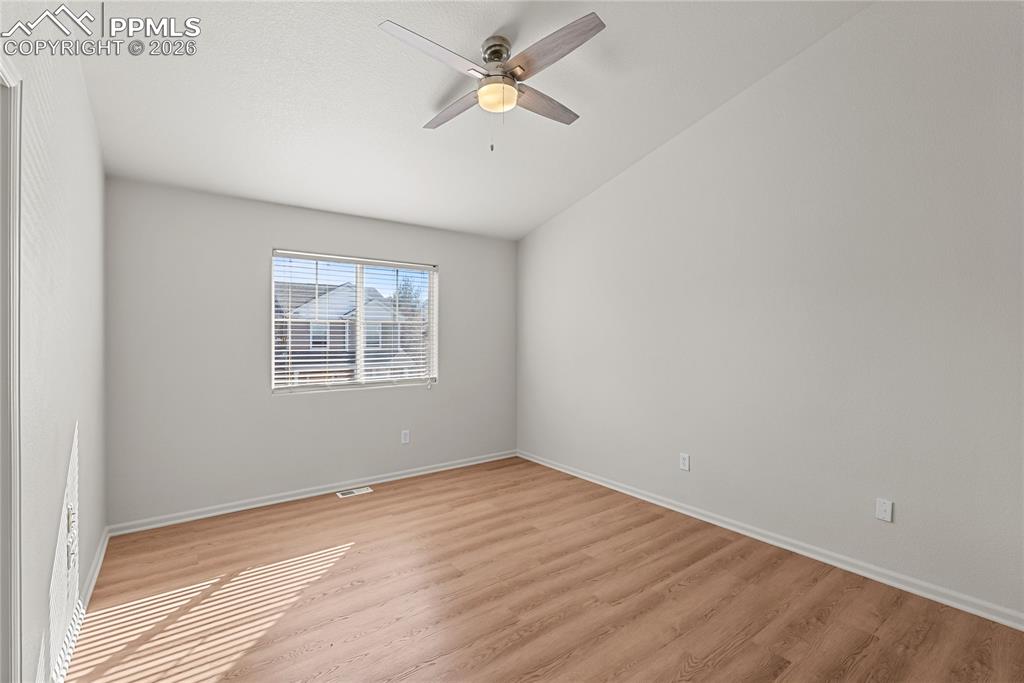 7795 Sandy Springs Point Fountain, CO 80817 - Photo 13 of 36 an empty room with a window and a fan