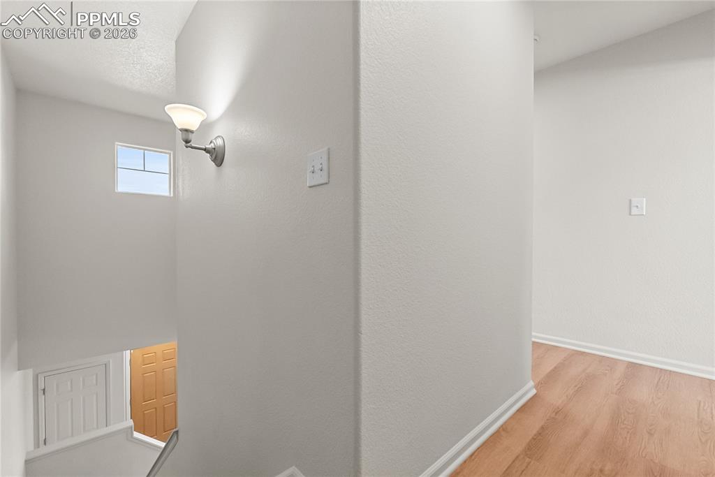 7795 Sandy Springs Point Fountain, CO 80817 - Photo 17 of 36 a view of a room with wooden floor and fan