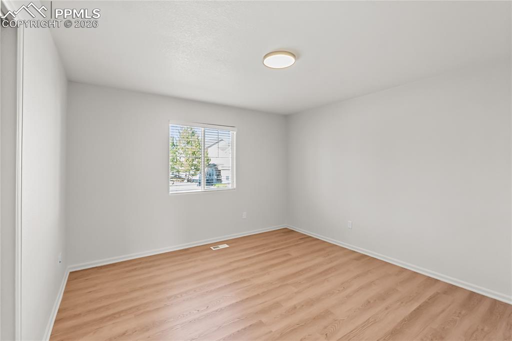 7795 Sandy Springs Point Fountain, CO 80817 - Photo 18 of 36 an empty room with a window