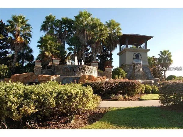 a view of a back yard of the house