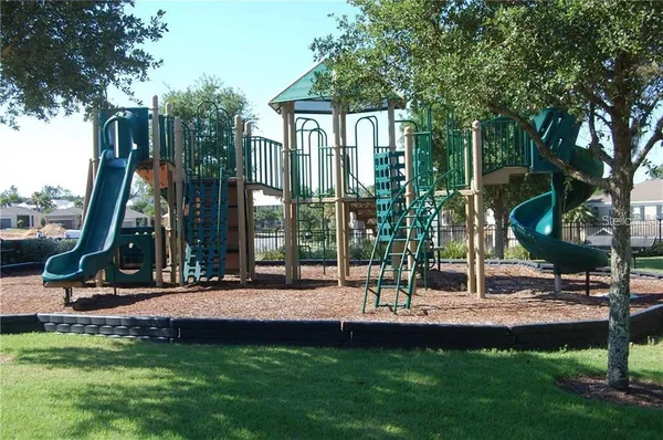 a view of a park with a slide