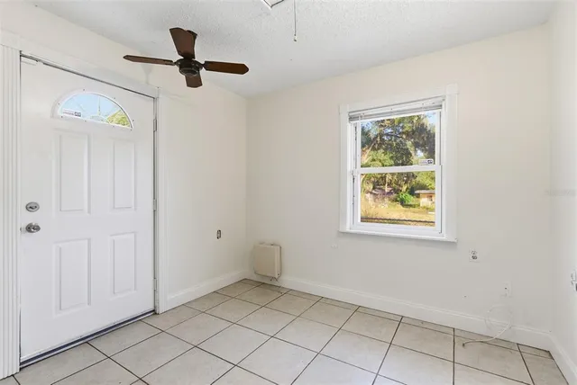 an empty room with windows