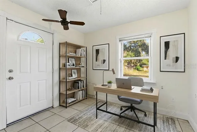 a workspace with a bookshelf