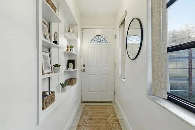 a view of a hallway with entryway