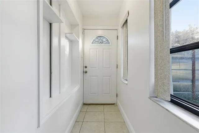 a view of a hallway with elevator