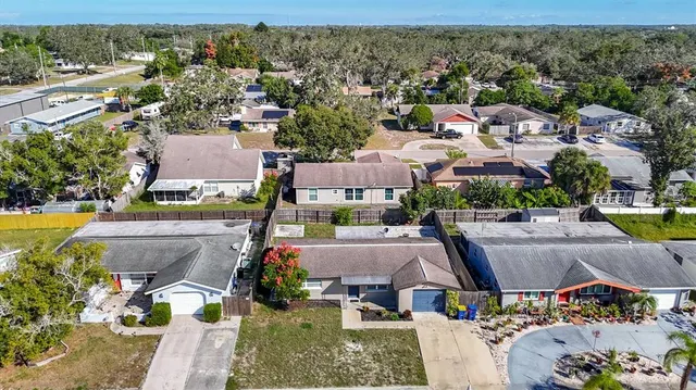an aerial view of a house with garden
