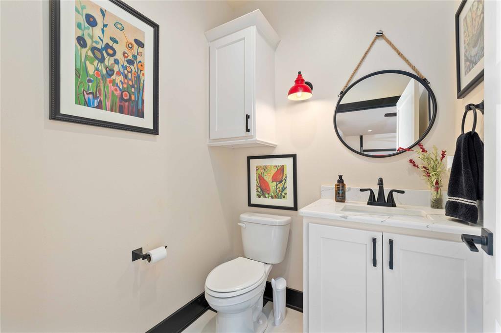 1010 Fm 583 Street West Rising Star, TX 76471 - Photo 14 of 40 a bathroom with a toilet a sink and a mirror