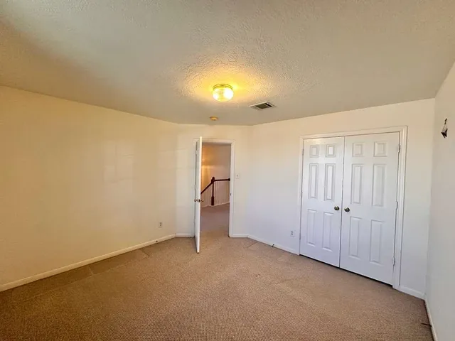 a bathroom with a tub and a shower