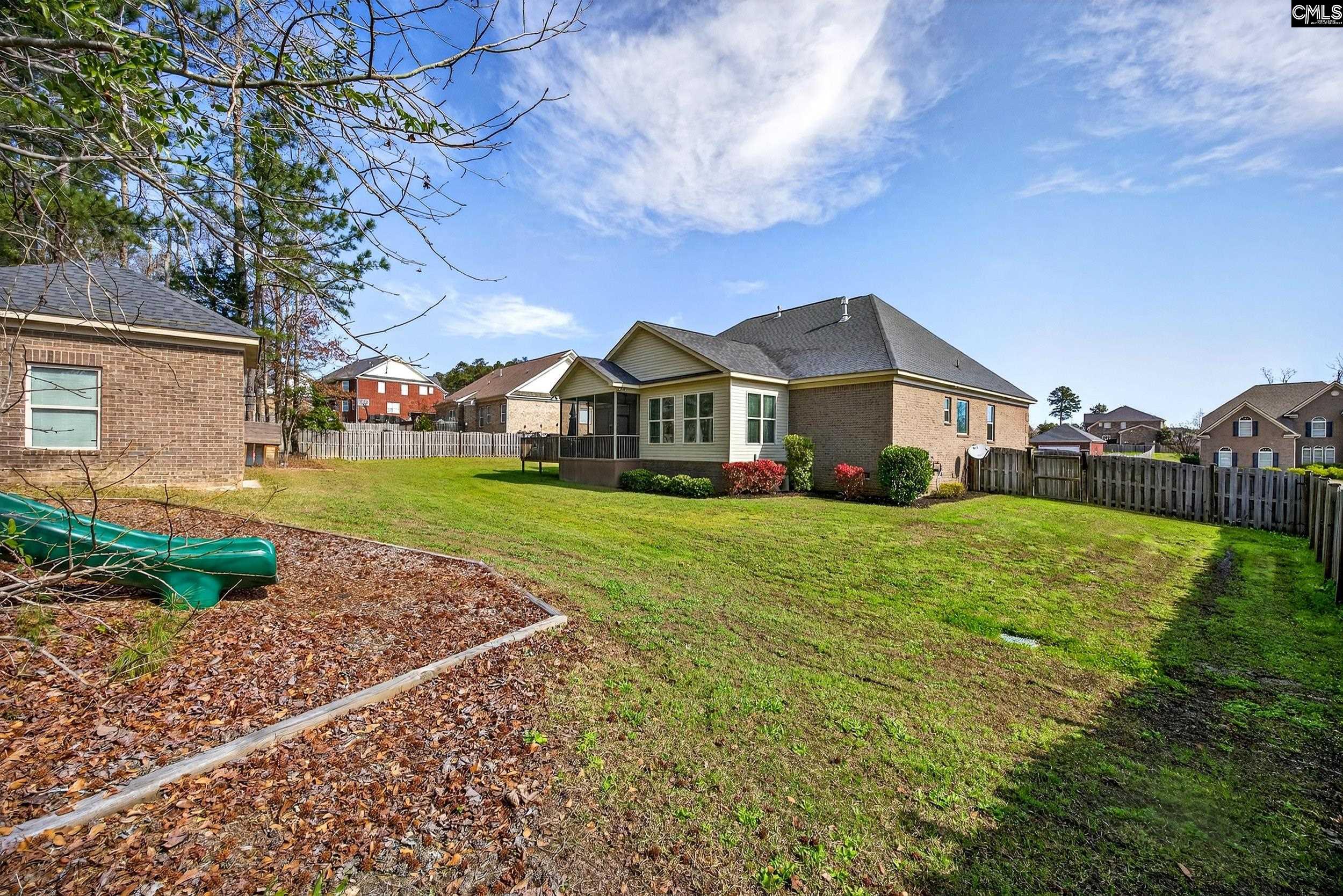 116 Renard Way Gilbert, SC 29054 - Photo 57 of 74 a front view of house with yard and green space