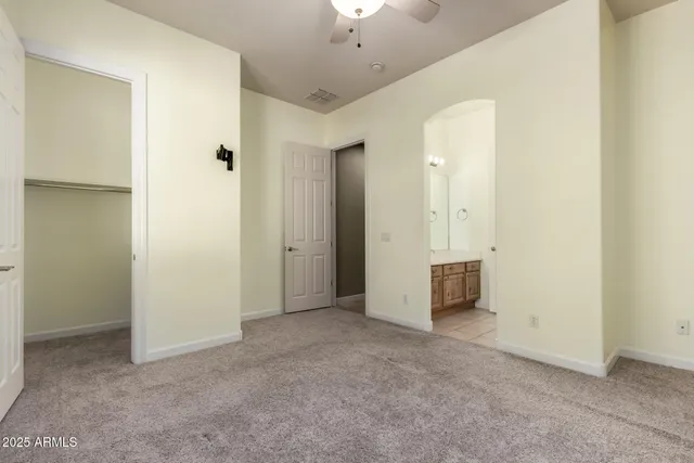 a view of a patio with swimming pool and furniture