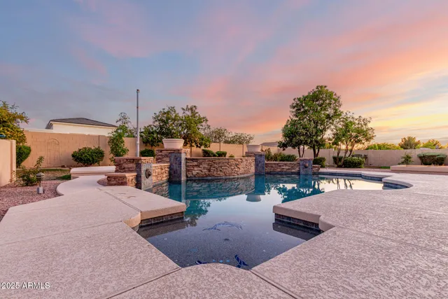 a patio with table and chairs