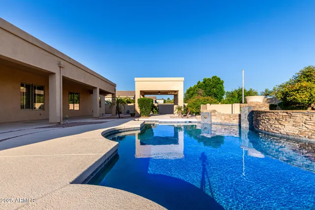 an aerial view of residential house with outdoor space