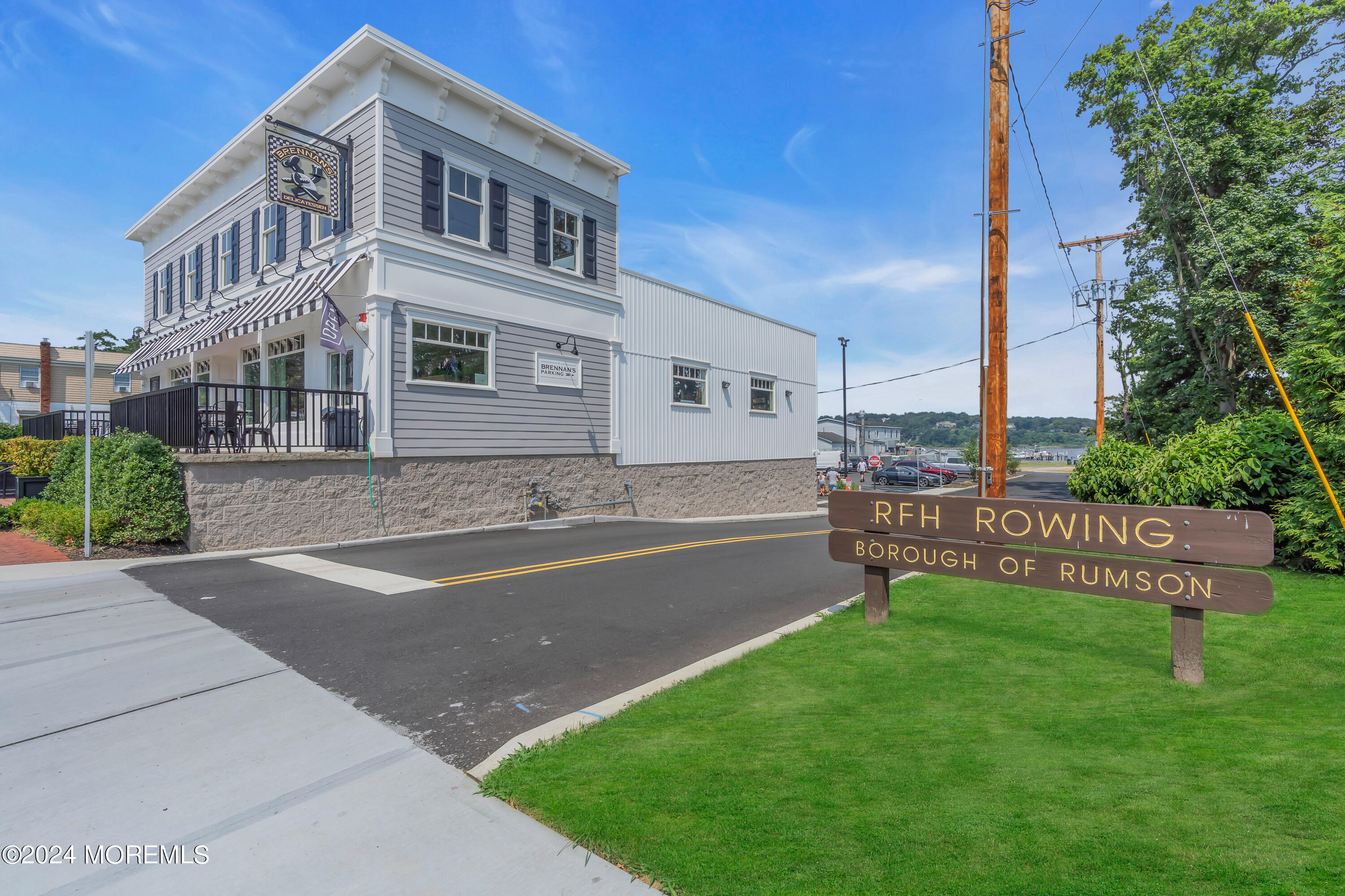 57 River Road Rumson, NJ 07760 - Photo 37 of 38 a view of a house with a yard and sitting area