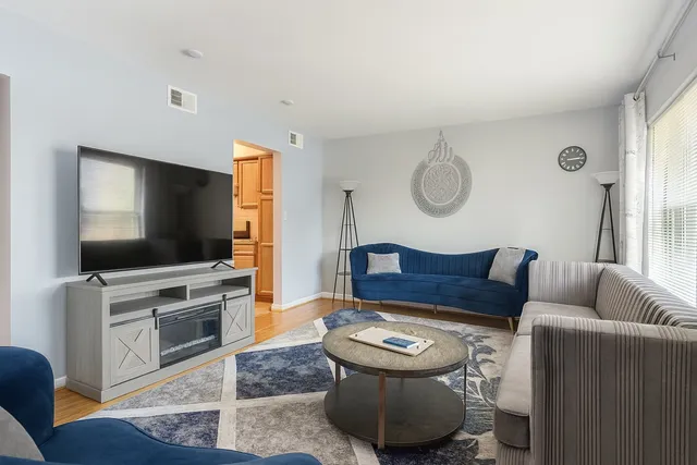 a kitchen with stainless steel appliances granite countertop a stove and a sink