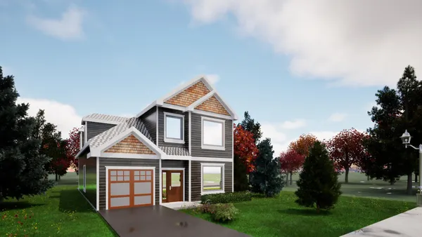 a front view of a house with a yard and trees