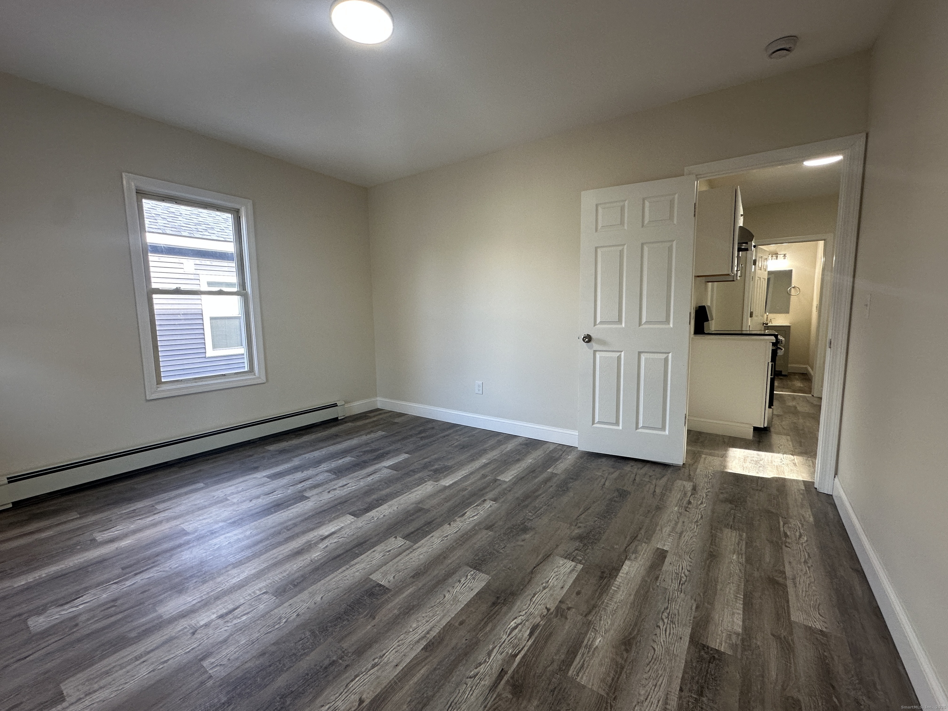 85 Twiss Street Meriden, CT 06450 - Photo 14 of 23 a view of a livingroom with wooden floor