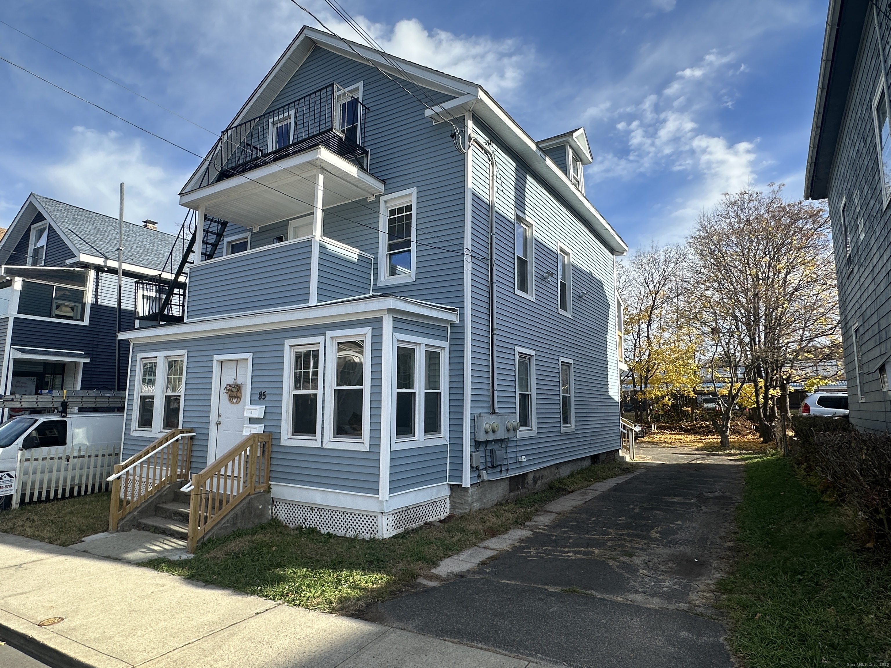 85 Twiss Street Meriden, CT 06450 - Photo 21 of 23 a front view of a house with a yard