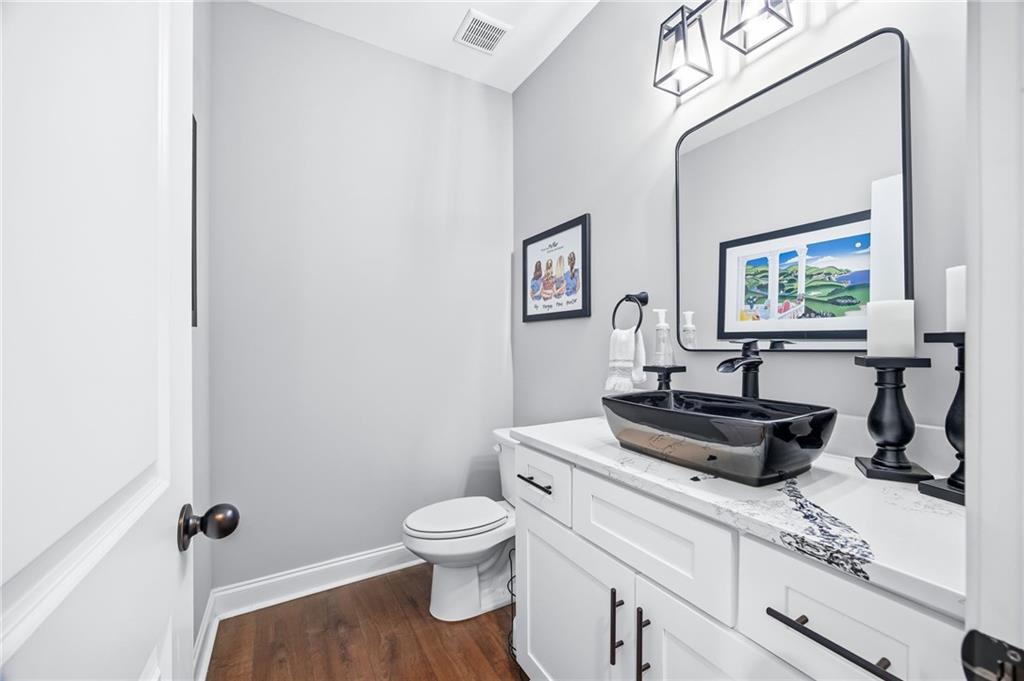 238 Observation Pointe Dallas, GA 30132 - Photo 18 of 41 a living room with furniture and a toilet