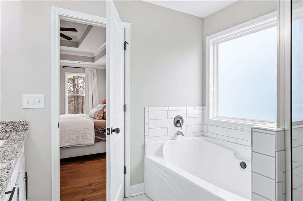 238 Observation Pointe Dallas, GA 30132 - Photo 22 of 41 a bathroom with a tub