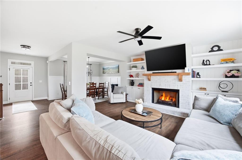 238 Observation Pointe Dallas, GA 30132 - Photo 10 of 41 a living room with furniture a fireplace and a flat screen tv
