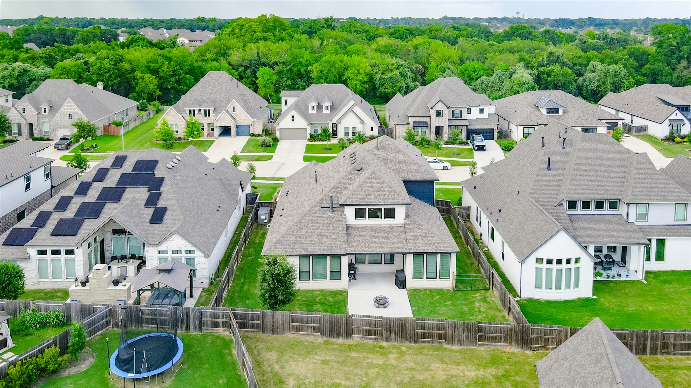 5318 Streamside Trail Fulshear, TX 77441 - Photo 31 of 43 Take in the breathtaking aerial view of the backyard of this remarkable home.