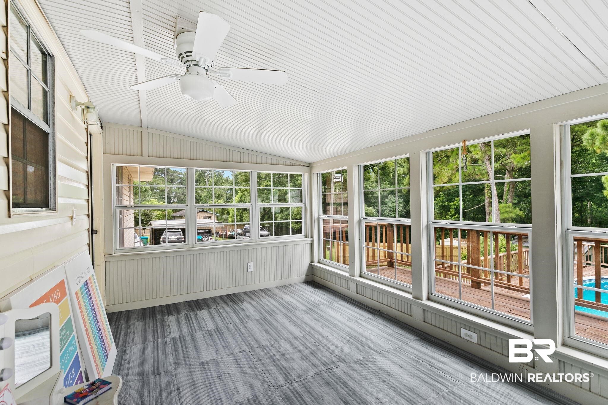 14 Lee Circle Daphne, AL 36527 - Photo 36 of 83 Unfurnished sunroom with vaulted ceiling, plenty of natural light, and ceiling fan