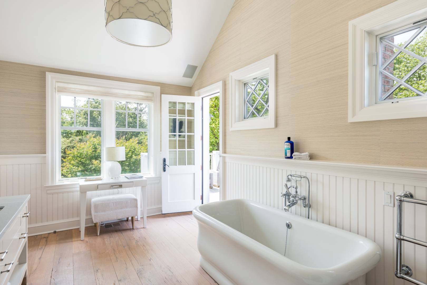 95 Egypt Lane East Hampton, NY 11937 - Photo 17 of 37 a bath tub sitting next to a window