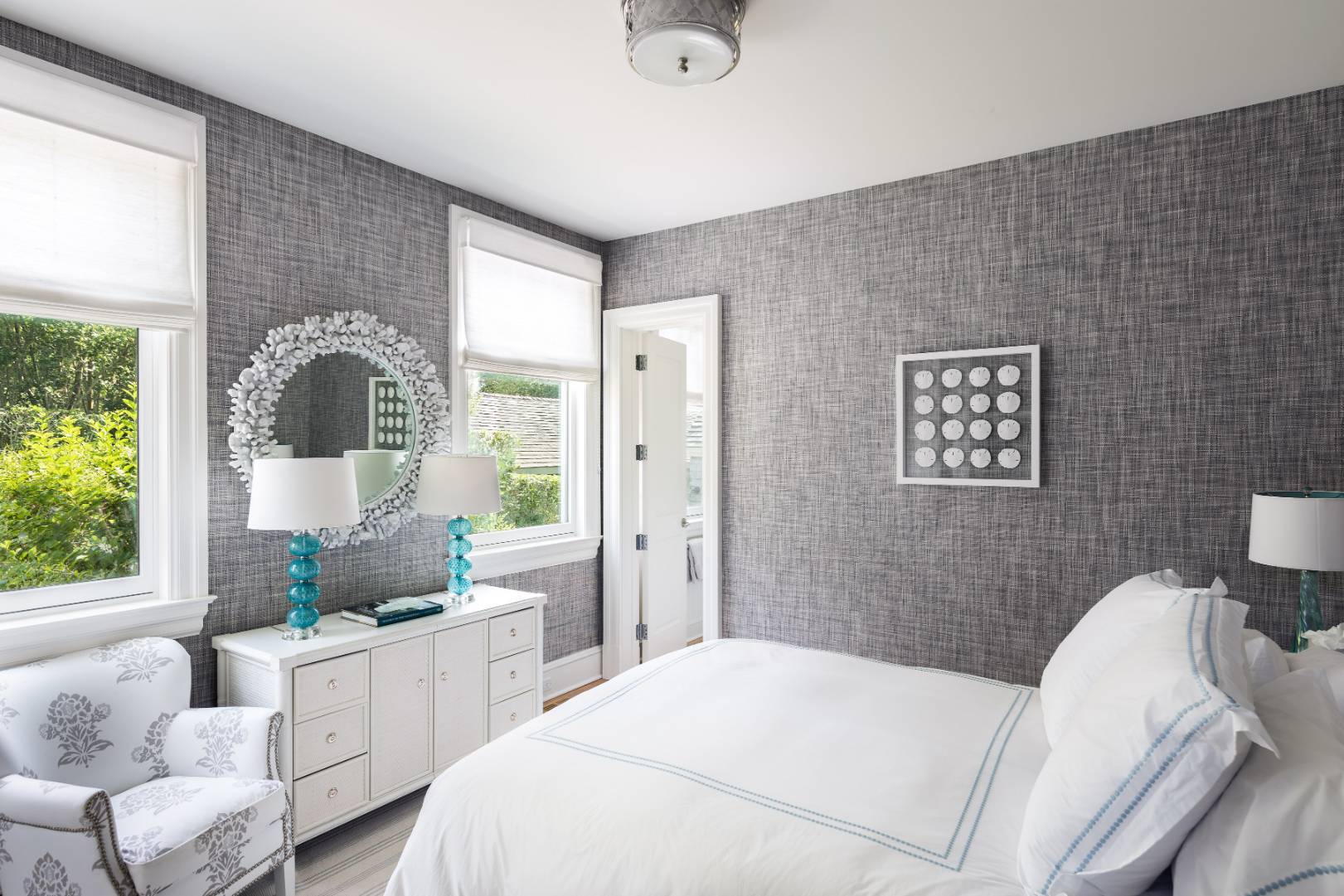 95 Egypt Lane East Hampton, NY 11937 - Photo 19 of 37 a bedroom with a bed couch and window