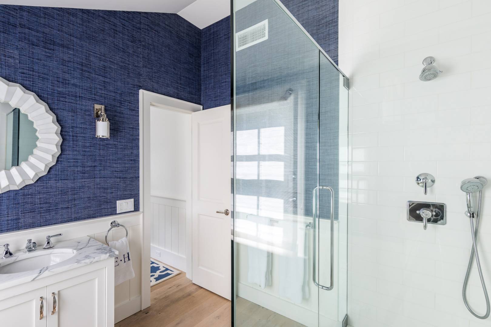 95 Egypt Lane East Hampton, NY 11937 - Photo 20 of 37 a bathroom with a granite countertop sink a toilet and shower
