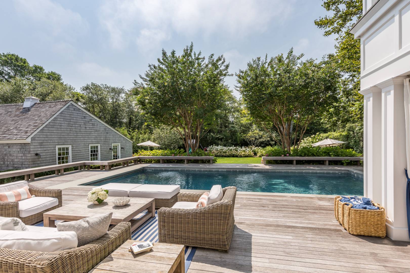 95 Egypt Lane East Hampton, NY 11937 - Photo 28 of 37 a view of swimming pool with lounge chair and trees