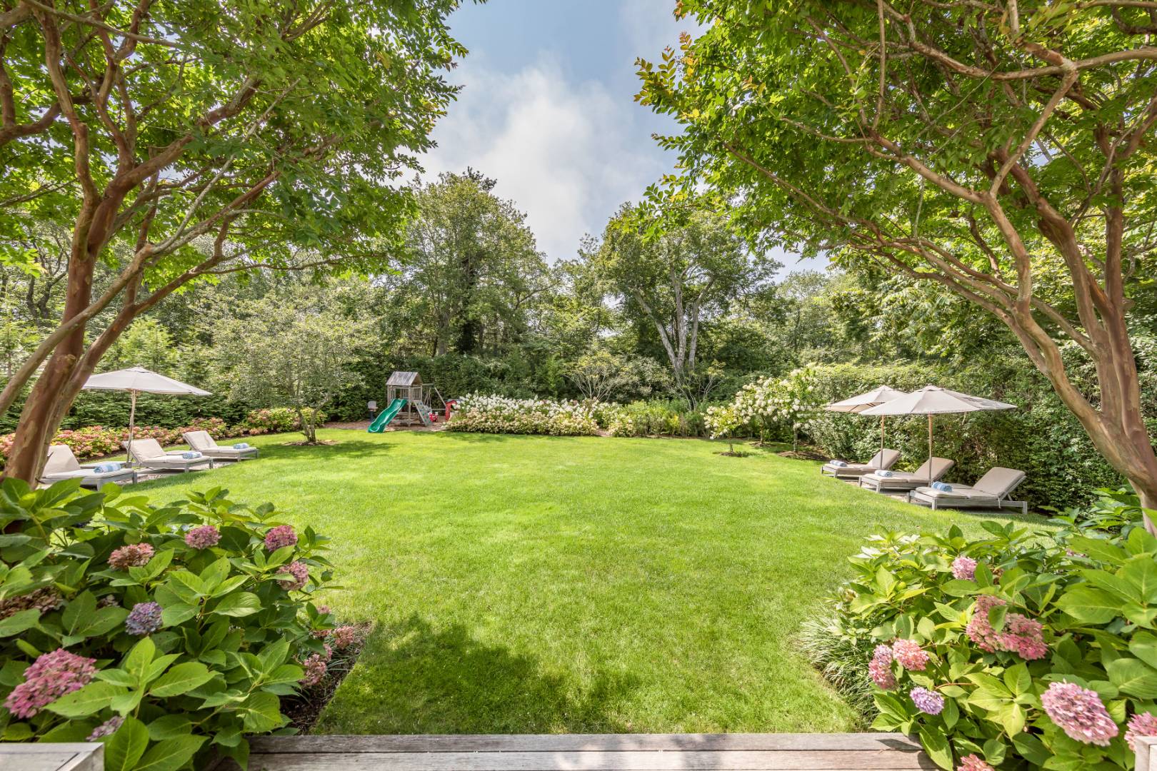 95 Egypt Lane East Hampton, NY 11937 - Photo 36 of 37 a view of yard with green space