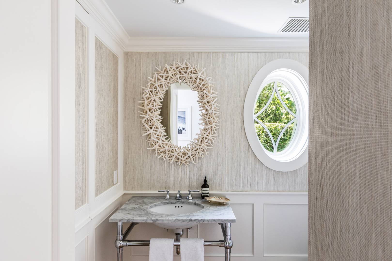 95 Egypt Lane East Hampton, NY 11937 - Photo 10 of 37 a bathroom with a sink and a mirror