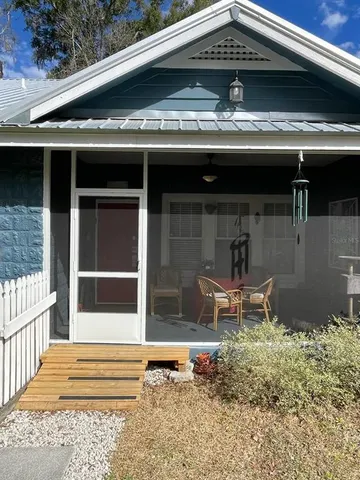 a view of a porch with a bench