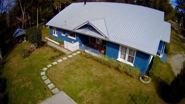 a view of a house with a swimming pool