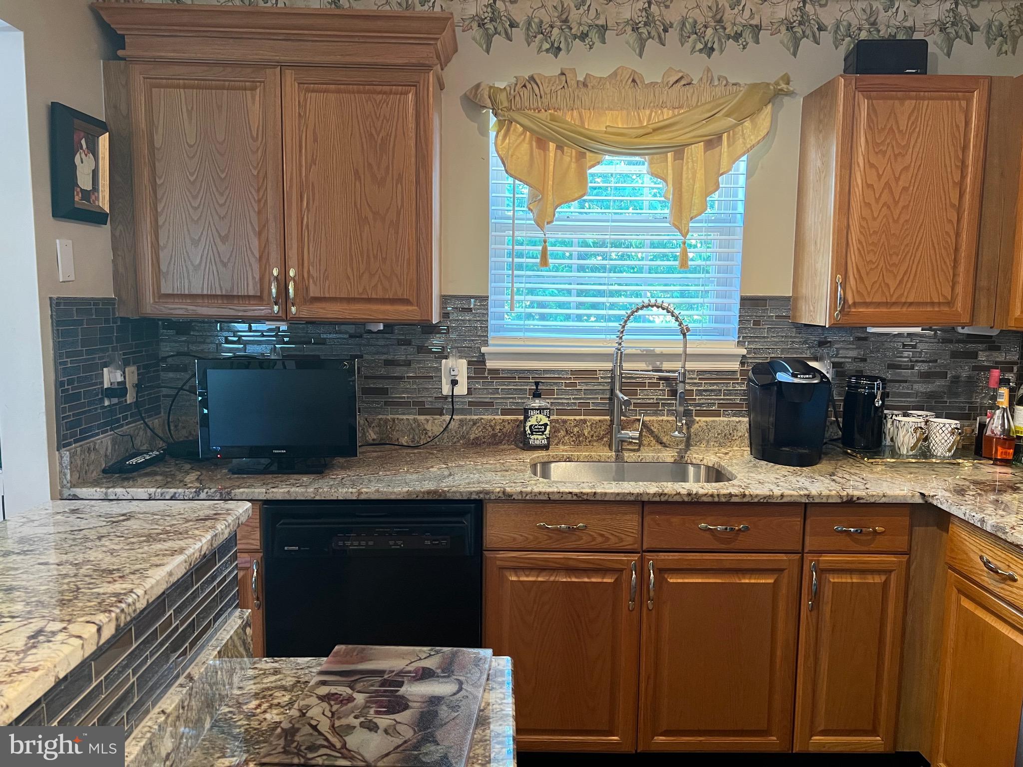 8605 Daytona Road Rosedale, MD 21237 - Photo 12 of 66 KITCHEN WITH GRANITE AND NEW BACK SPLASH