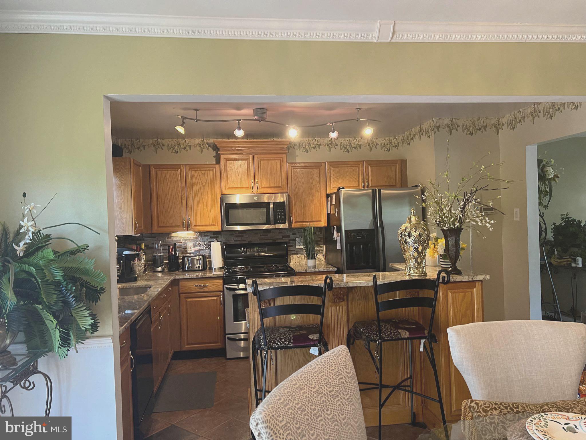 8605 Daytona Road Rosedale, MD 21237 - Photo 8 of 66 VIEW FROM DINING INTO KITCHEN
