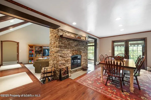 a view of a dining room with furniture window and outside view