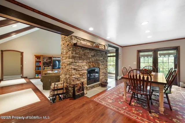 a view of a dining room with furniture window and outside view