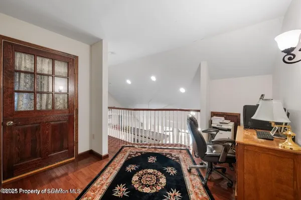 a backyard of a house with lots of plants